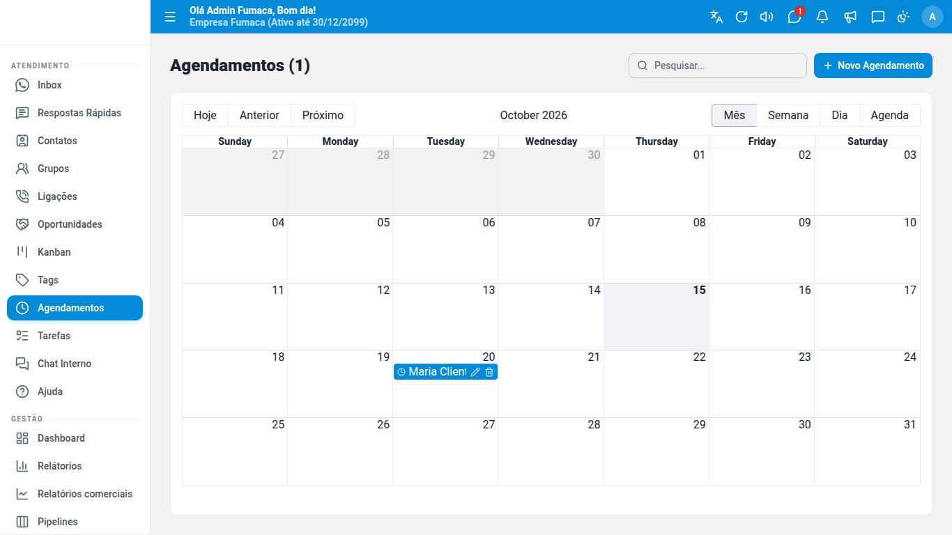 Tela de Agendamentos do Dialogix com o calendário do mês e uma mensagem agendada para um contato.